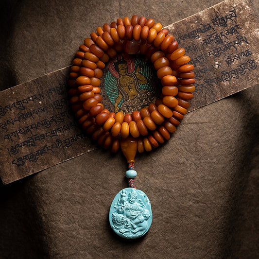 African Amber 108 Mala Beads with Turquoise Carved Jambhala